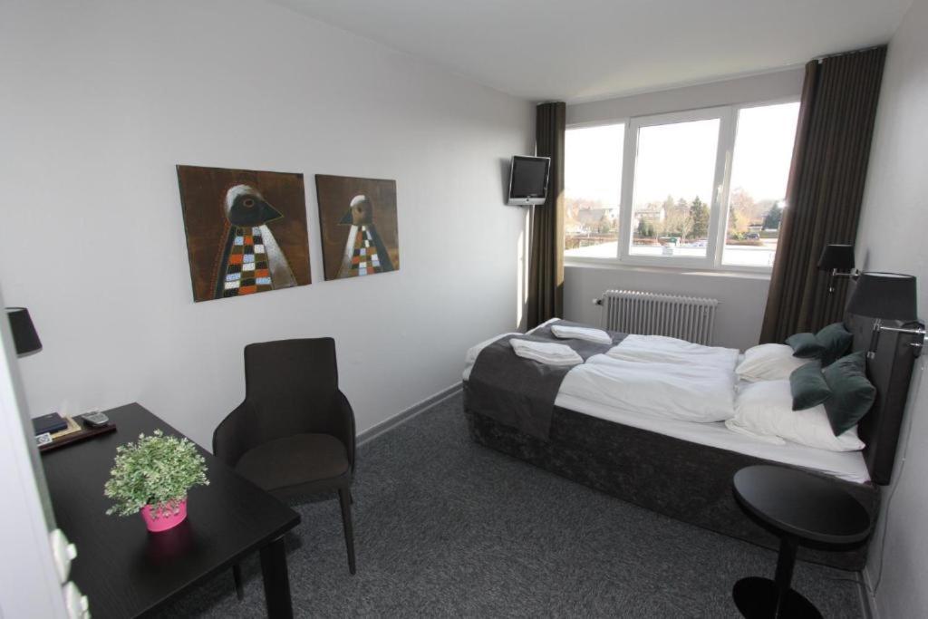 Banegaardshotellet Vojens المظهر الخارجي الصورة